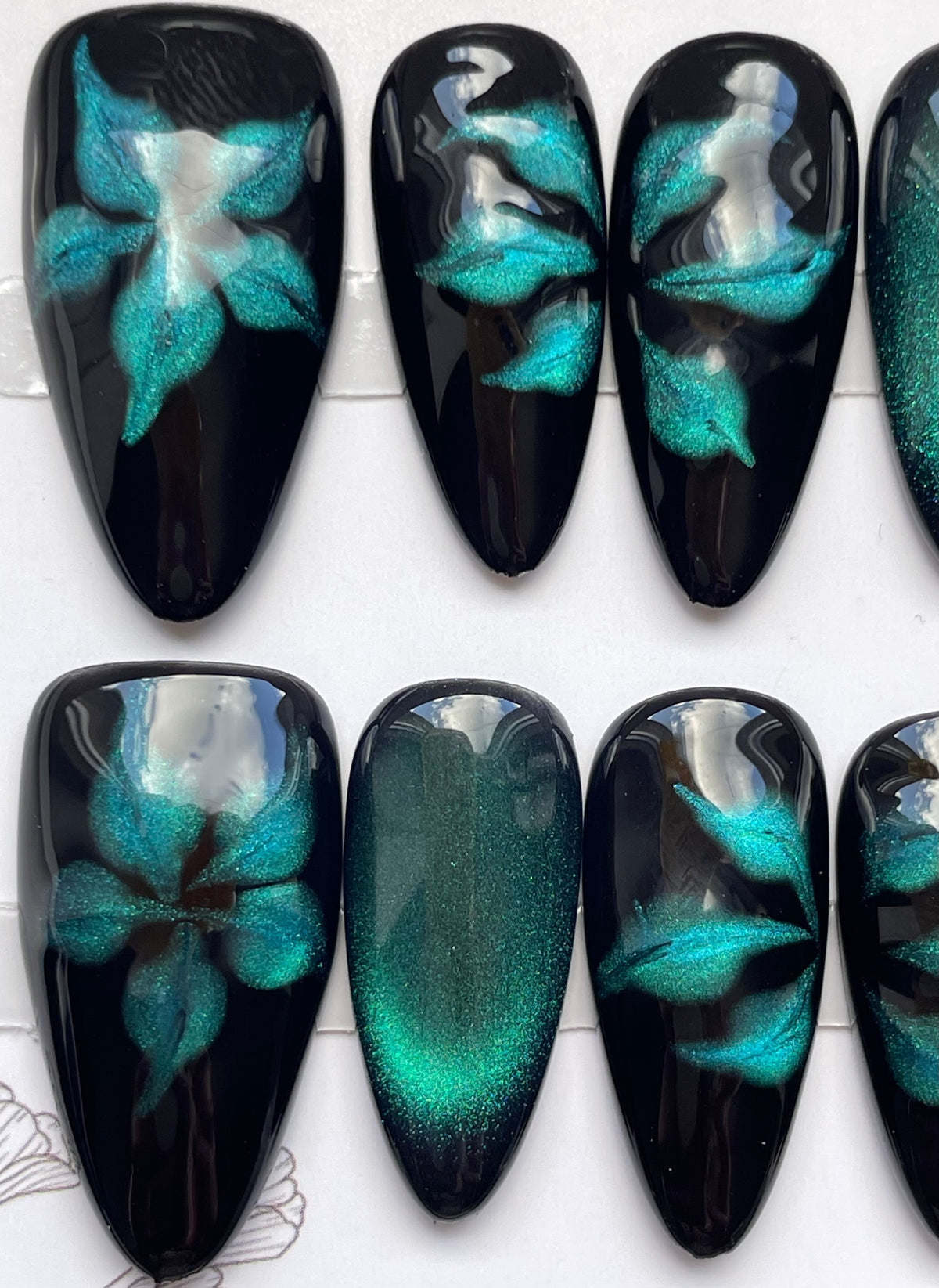 Deep teal flower almond
